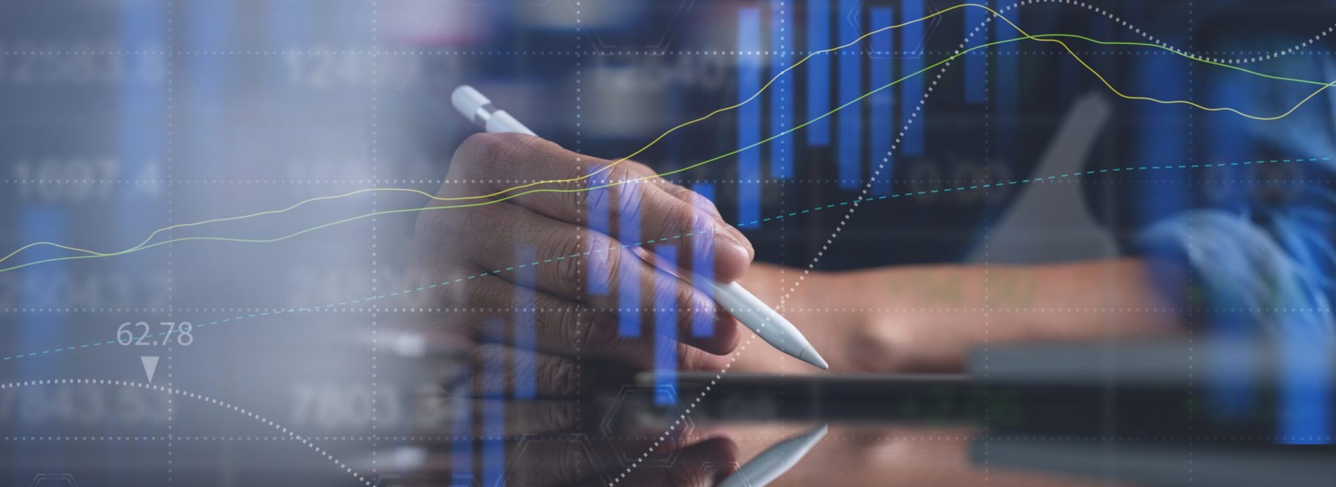 Business analysis, stock market report, modern technology concept. Finance analyst, stock trader analysing business data, financial graph on digital tablet and laptop computer with candlestick graph interface